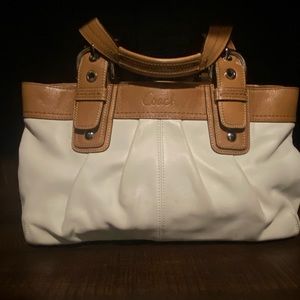 COPY - COACH Soho Hampton Leather Handbag in white with tan trim.